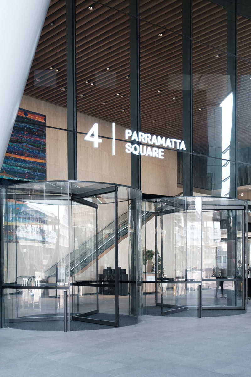 The inside of an office building showing revolving entry doors